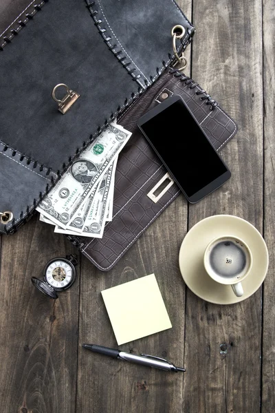 Woman bag stuff and coffee from above — Stock Photo, Image