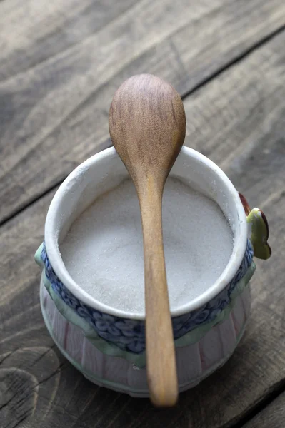 Sugar bowl with a wooden spoon — Stock Photo, Image