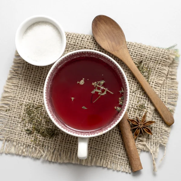 Tea in vintage cup on wooden table — Stock Photo, Image