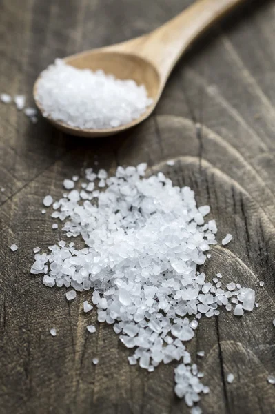 Sea salt in wooden  spoon — Stock Photo, Image