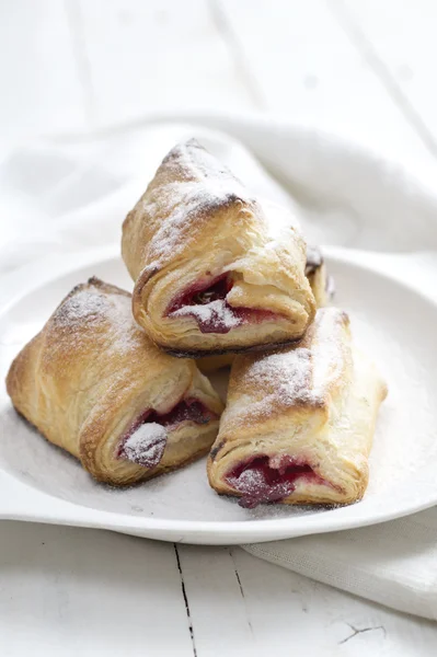 Puff Pastry Cherry Turnovers on desk — Stock Photo, Image