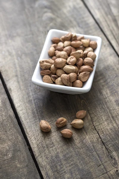 Bowl of hazelnuts — Stock Photo, Image