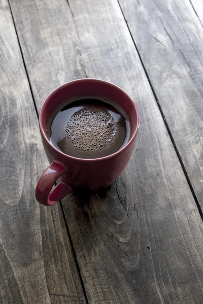 Tazza di caffè su sfondo di legno — Foto Stock