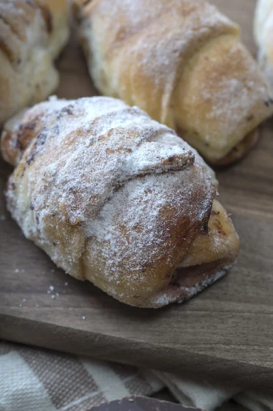 Baked croissants stuffed with jam — Stock Photo, Image