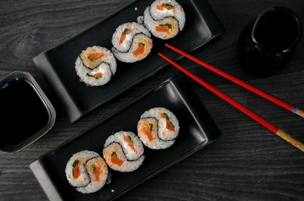 Delicious sushi rolls on the plate — Stock Photo, Image