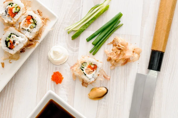 Sushi rolls with ingredients — Stock Photo, Image