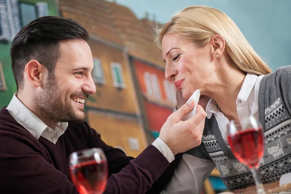 Young couple in love at restaurant — Stock Photo, Image