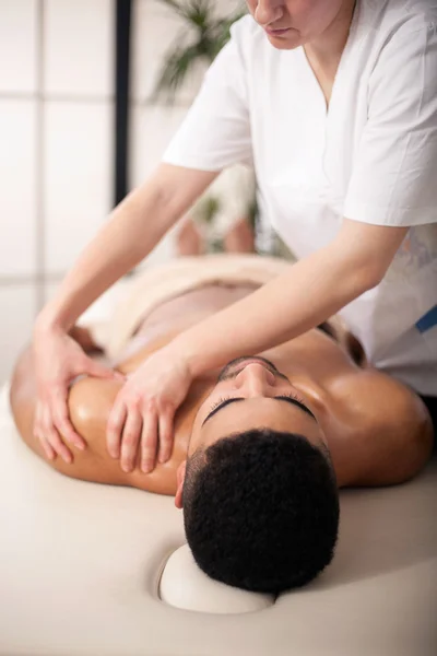 A young man at spa saloon — Stock Photo, Image