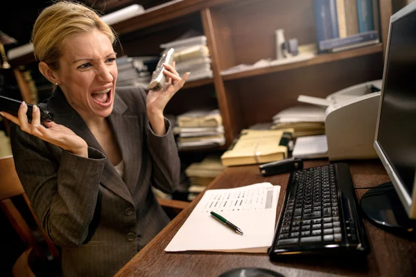Businesswoman under stress — Stock Photo, Image
