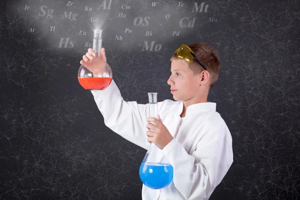 Concept of young boy chemist — Stock Photo, Image