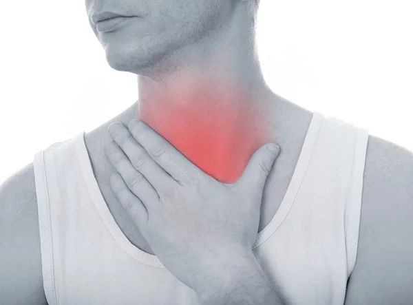 Острая боль в горле у молодого человека — стоковое фото