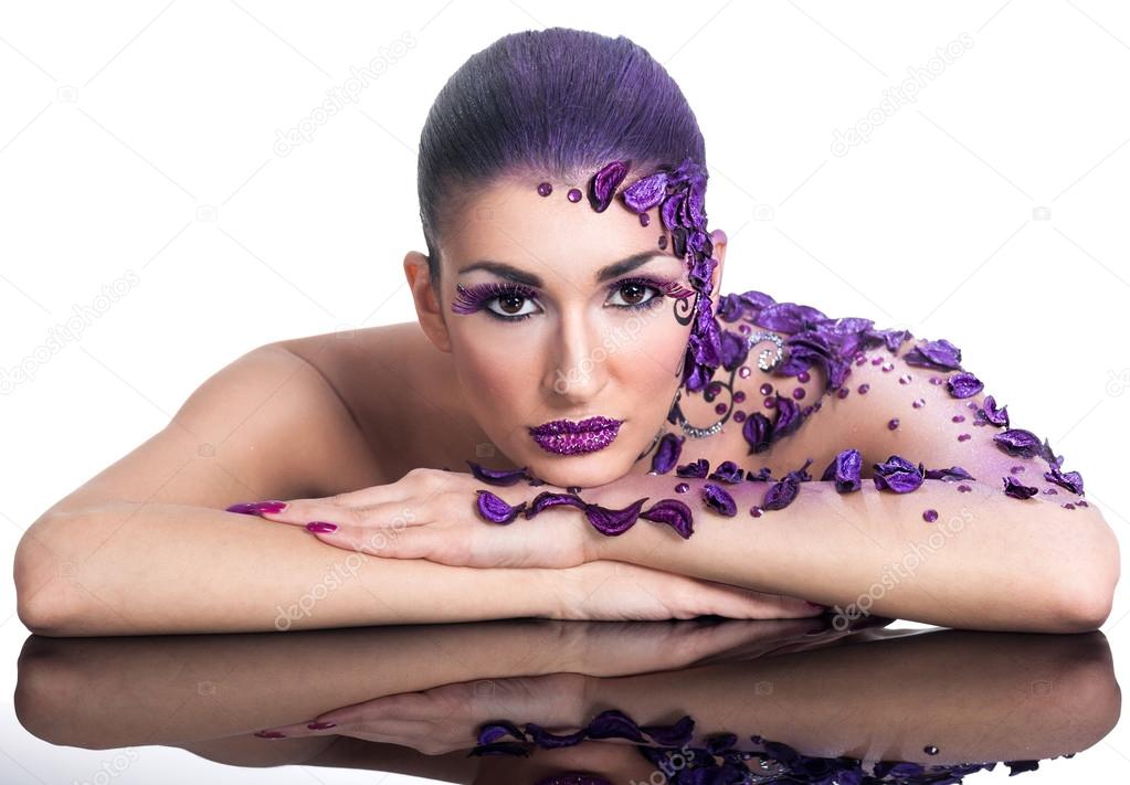 woman with beautiful hair style and art abstract make-up