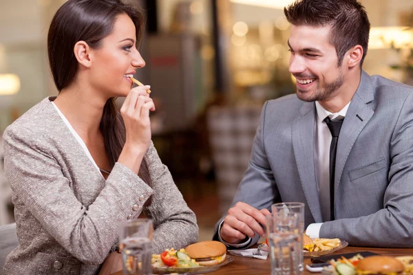 Business couple enjoy in lunch at restaurant — Stock Photo, Image