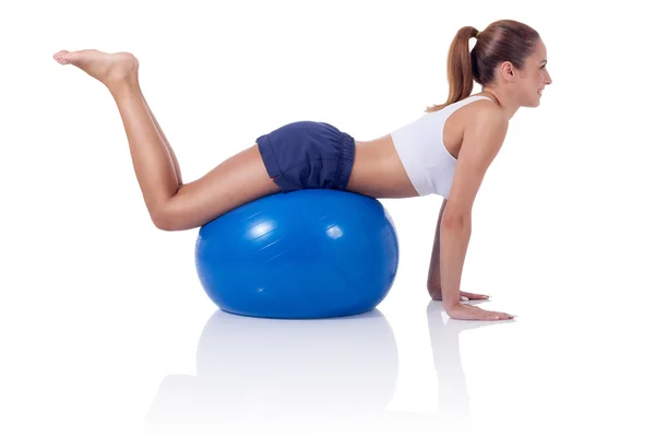 Chica joven ejercicio en la pelota —  Fotos de Stock