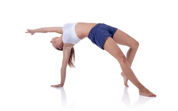 Fitness girl doing exercise on mat — Stock Photo, Image