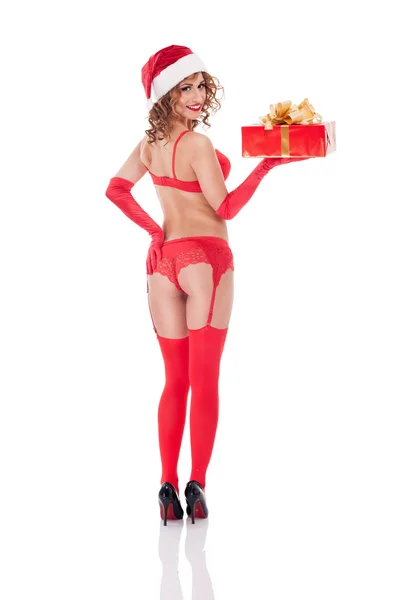 Beautiful sexy girl wearing red santa claus clothes with christm — Stock Photo, Image