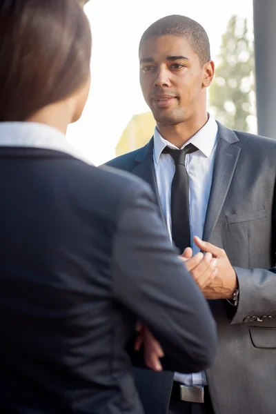 Successful business man and woman outdoors — Stock Photo, Image