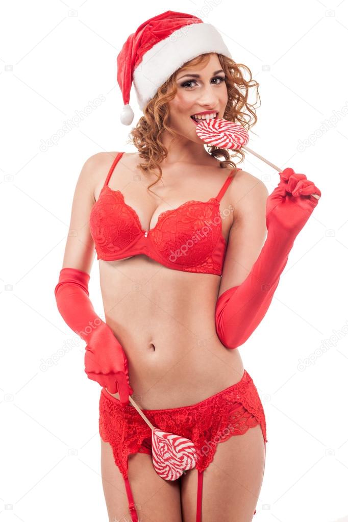 Portrait of sexy santa girl with candy cane isolated on with bac Stock  Photo by ©pyotr021 88233484