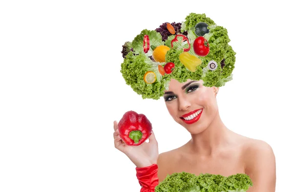 Beautiful happy young woman with vegetables on her head — Stock Photo, Image