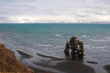 Spectacular Icelandic coastline with Hvitserkur rock clipart