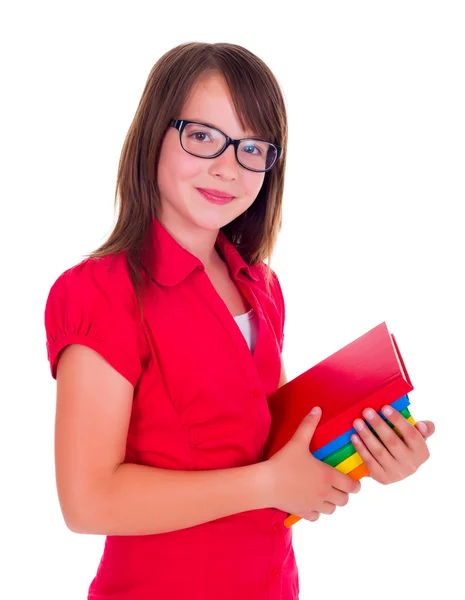 Portrait d'écolière souriante tenant des livres — Photo