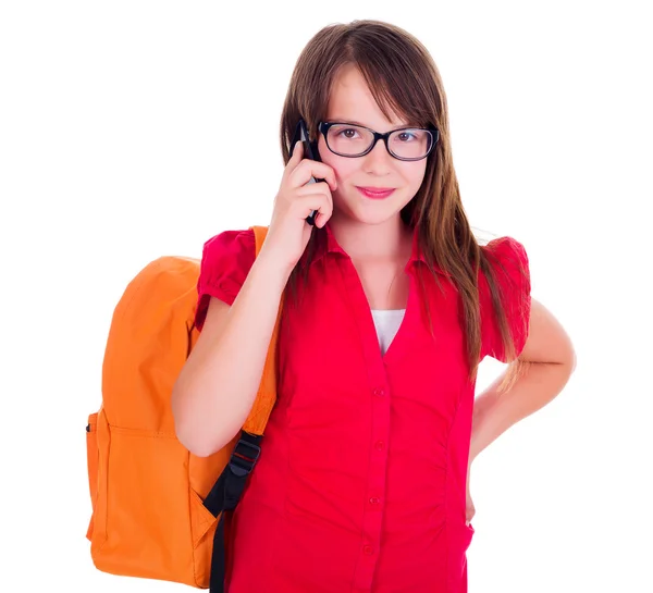 Schoolgirl talking on mobile phone — Stock Photo, Image