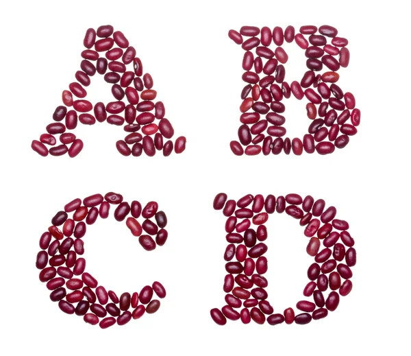 Capital characters made of red kidney beans — Stock Photo, Image