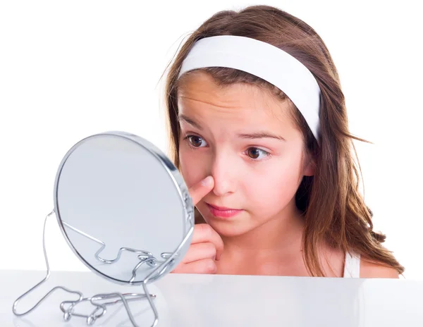 Girl searching for pimples — Stock Photo, Image
