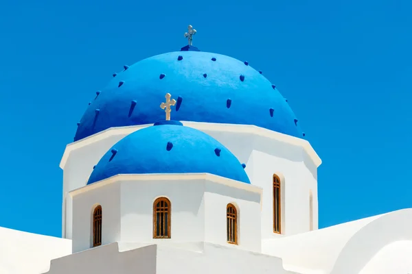 Greek church with blue dome in Santorini — Stock Photo, Image