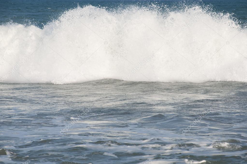Waves breaking near the shore at Arugam Bay