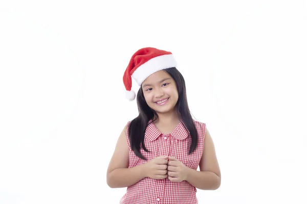 Beyaz Arka Planda Noel Baba Şapkası Takan Mutlu Küçük Asyalı — Stok fotoğraf