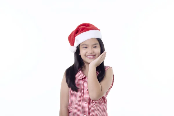 Glad Liten Asiatisk Flicka Bär Santa Hatt Pekade Vit Bakgrund — Stockfoto