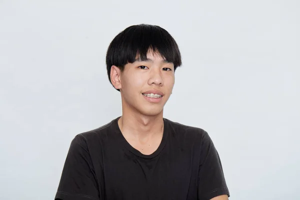 Smiling Cute Asian Man Black Shirt Looking Camera Studio Shot — Stok Foto