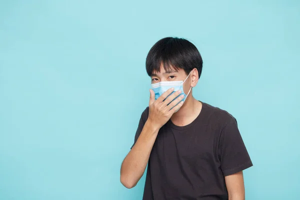 Close Jovem Asiático Vestindo Uma Máscara Facial Contra Covid Fundo — Fotografia de Stock