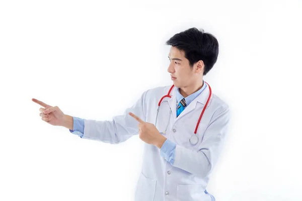 Asian Man Doctor Medical Gown Stethoscope Pointing Index Fingers Aside — Stock Photo, Image