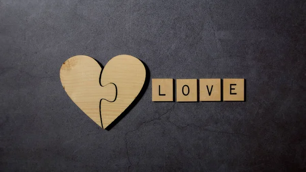 Love Text Word Wood Blocks Withe Wooden Heart Black Cement — стоковое фото