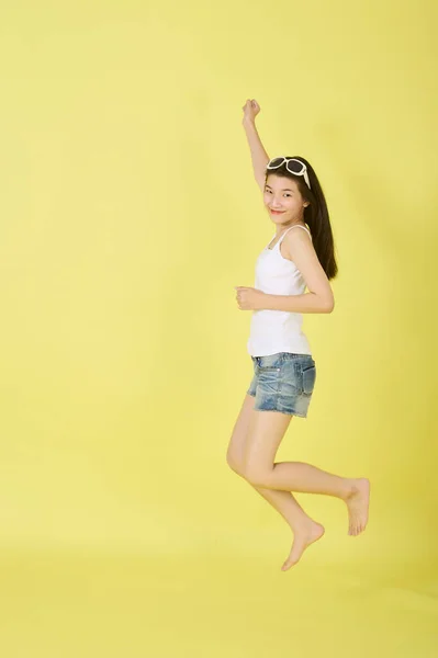 Portrait Pretty Young Asian Girl Happy Jumping Mid Air Bright — Stock Photo, Image