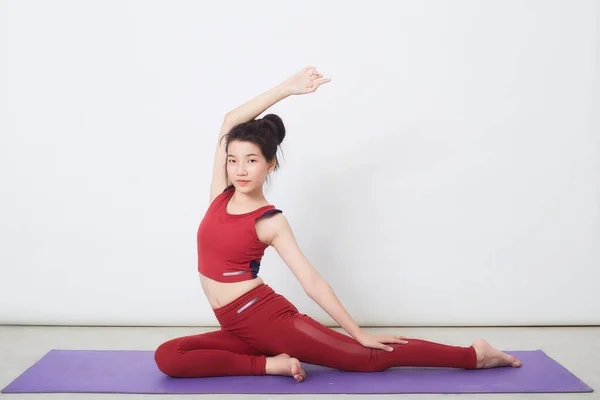 Young Asian Woman Exercise Light Background — Stock fotografie