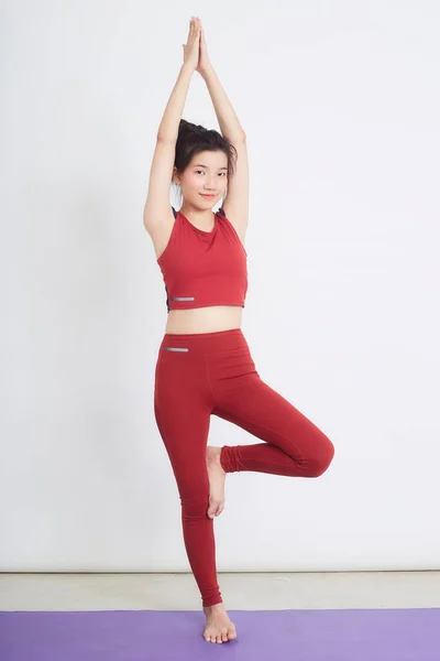 Young Asian Woman Exercise Light Background — Stock fotografie