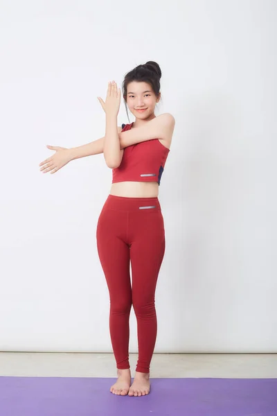 Young Asian Woman Exercise Light Background — Zdjęcie stockowe
