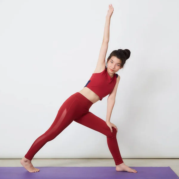 Young Asian Woman Exercise Light Background — Stock fotografie