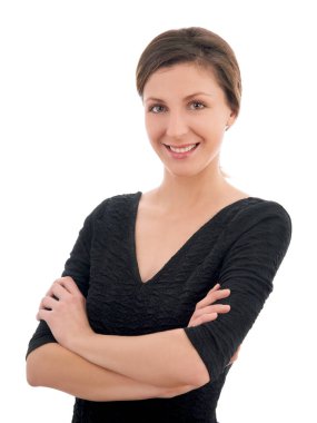 Elleri beyaz arka planda katlanmış güzel genç bir kadın. 