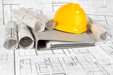 Sarı başlık, gri klasör ve proje çizimleri