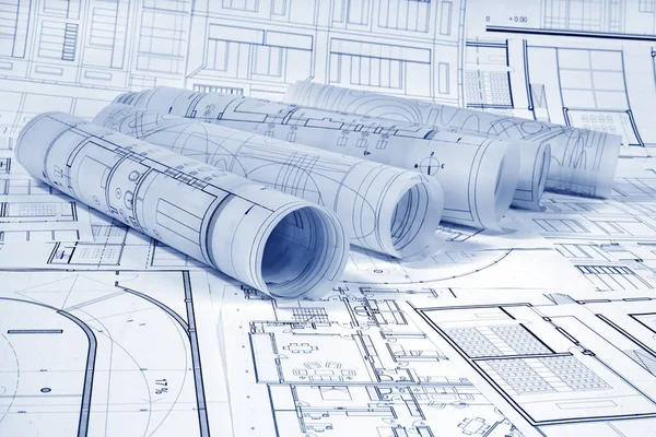 architectural drawings of blueprints and pencil
