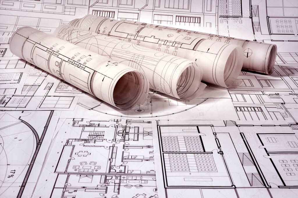 architectural drawings, architecture and construction concept-architect drawing with blueprints and pencil