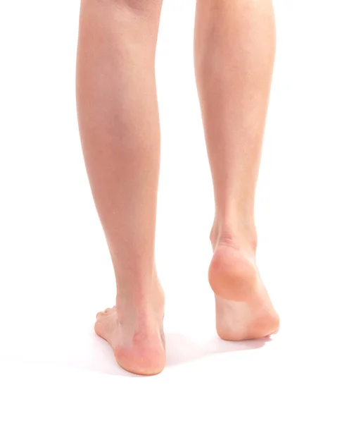 白い背景に美しい女性の足と足 — ストック写真