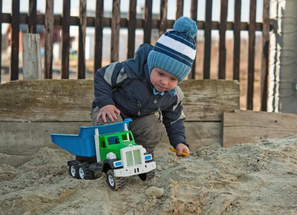 Play in sand box — Stock Photo, Image