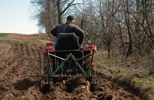 Tractor plowing — Stock Photo, Image