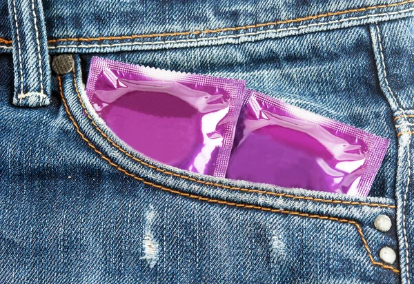 Two violet condom — Stock Photo, Image