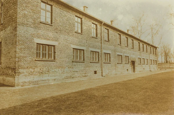 Aged sepia digital grunge distressed effect auschwitz concentrat — Stock Photo, Image